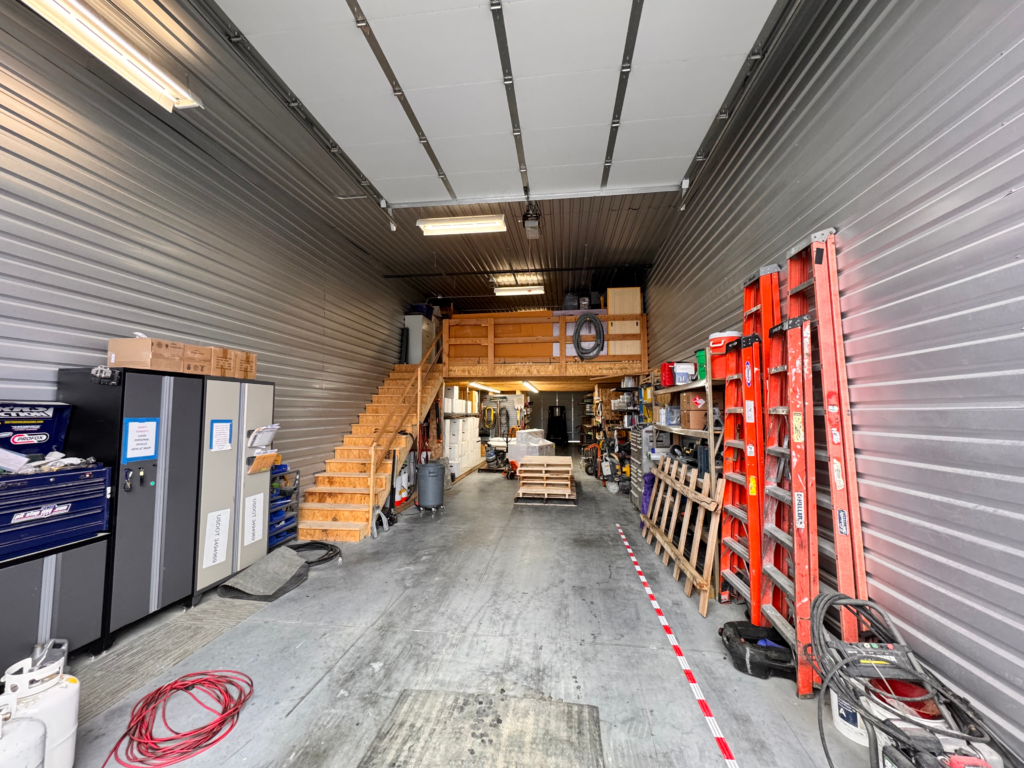 Contractor bays in Bellevue, NE with heated and non-heated warehouse units, power, lighting, and secure access. Flexible leasing near Omaha Photo